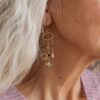 Chy Gold Tone Charm Earrings